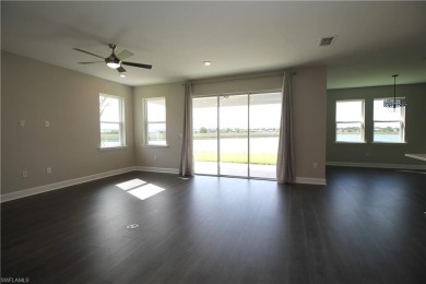 Gorgeous newer home in Valencia Lakes bult in 2022.  Available on Valencia Golf and Country Club in Florida - for sale on GolfHomes.com, golf home, golf lot