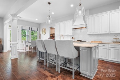 This exquisite home offers a unique blend of warm living spaces on Skybrook Golf Club in North Carolina - for sale on GolfHomes.com, golf home, golf lot