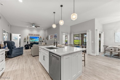 THIS IS LUXURY LIVING IN GATEWAY ! RENOVATED 4 BEDROOM AND 3 on Gateway Golf and Country Club in Florida - for sale on GolfHomes.com, golf home, golf lot