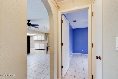 Opportunity knocking. Easy care tiled front entrance foyer (11'x on Daytona Beach Golf Club in Florida - for sale on GolfHomes.com, golf home, golf lot