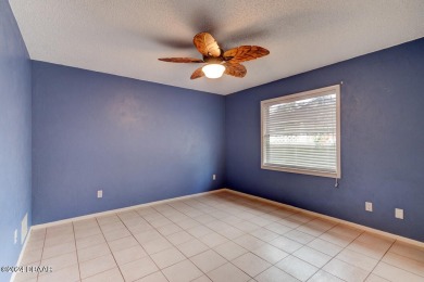 Opportunity knocking. Easy care tiled front entrance foyer (11'x on Daytona Beach Golf Club in Florida - for sale on GolfHomes.com, golf home, golf lot