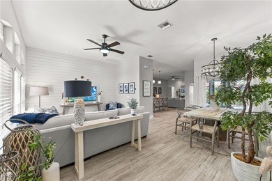 THIS IS LUXURY LIVING IN GATEWAY ! RENOVATED 4 BEDROOM AND 3 on Gateway Golf and Country Club in Florida - for sale on GolfHomes.com, golf home, golf lot