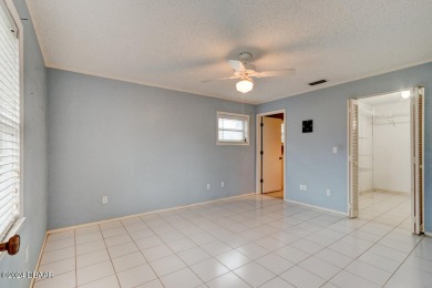 Opportunity knocking. Easy care tiled front entrance foyer (11'x on Daytona Beach Golf Club in Florida - for sale on GolfHomes.com, golf home, golf lot