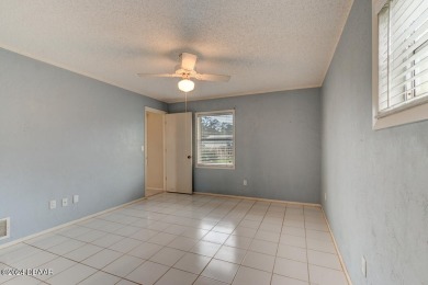 Opportunity knocking. Easy care tiled front entrance foyer (11'x on Daytona Beach Golf Club in Florida - for sale on GolfHomes.com, golf home, golf lot