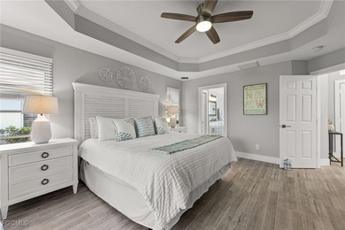 THIS IS LUXURY LIVING IN GATEWAY ! RENOVATED 4 BEDROOM AND 3 on Gateway Golf and Country Club in Florida - for sale on GolfHomes.com, golf home, golf lot