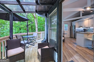 Feels like a treehouse. Perfect starter or vacation rental on Sky Valley Resort and Country Club in Georgia - for sale on GolfHomes.com, golf home, golf lot