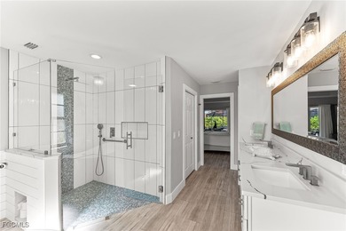 THIS IS LUXURY LIVING IN GATEWAY ! RENOVATED 4 BEDROOM AND 3 on Gateway Golf and Country Club in Florida - for sale on GolfHomes.com, golf home, golf lot