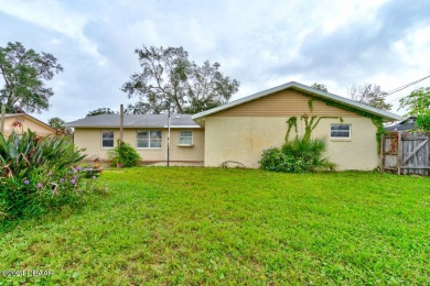 Opportunity knocking. Easy care tiled front entrance foyer (11'x on Daytona Beach Golf Club in Florida - for sale on GolfHomes.com, golf home, golf lot