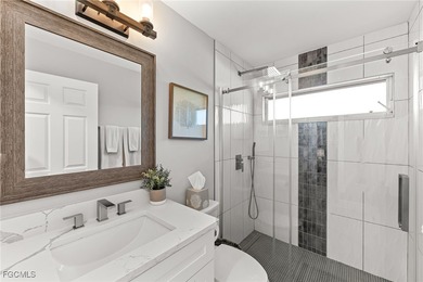 THIS IS LUXURY LIVING IN GATEWAY ! RENOVATED 4 BEDROOM AND 3 on Gateway Golf and Country Club in Florida - for sale on GolfHomes.com, golf home, golf lot