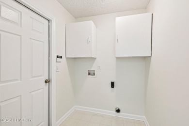 Welcome to this beautifully refreshed 3 bedroom, 2 bath home in on Golf Club At Fleming Island in Florida - for sale on GolfHomes.com, golf home, golf lot