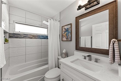 THIS IS LUXURY LIVING IN GATEWAY ! RENOVATED 4 BEDROOM AND 3 on Gateway Golf and Country Club in Florida - for sale on GolfHomes.com, golf home, golf lot