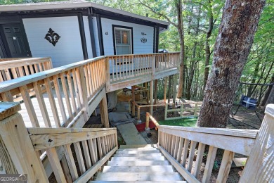 Feels like a treehouse. Perfect starter or vacation rental on Sky Valley Resort and Country Club in Georgia - for sale on GolfHomes.com, golf home, golf lot