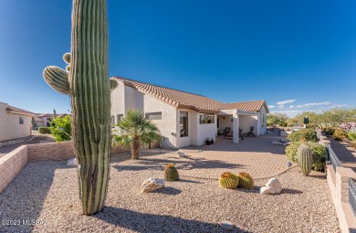 Situated on the golf course, this elegant home has the interior on Quail Creek Country Club - Road Runner in Arizona - for sale on GolfHomes.com, golf home, golf lot