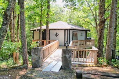 Feels like a treehouse. Perfect starter or vacation rental on Sky Valley Resort and Country Club in Georgia - for sale on GolfHomes.com, golf home, golf lot