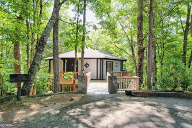 Feels like a treehouse. Perfect starter or vacation rental on Sky Valley Resort and Country Club in Georgia - for sale on GolfHomes.com, golf home, golf lot