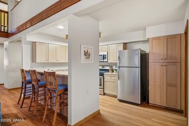 Charming and cozy cabin-style townhome nestled in the highly on Pinetop Lakes Golf and Country Club in Arizona - for sale on GolfHomes.com, golf home, golf lot