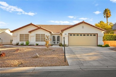 Charming one-story home located within an exclusive guard-gated on Los Prados Golf Course in Nevada - for sale on GolfHomes.com, golf home, golf lot