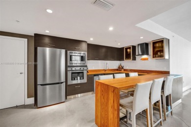 Exclusive boutique waterfront building with only 25 units on Indian Creek Country Club in Florida - for sale on GolfHomes.com, golf home, golf lot