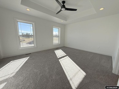 Step into this incredible custom-built home at 4225 Windsong on Riverton Country Club in Wyoming - for sale on GolfHomes.com, golf home, golf lot