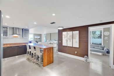 Exclusive boutique waterfront building with only 25 units on Indian Creek Country Club in Florida - for sale on GolfHomes.com, golf home, golf lot