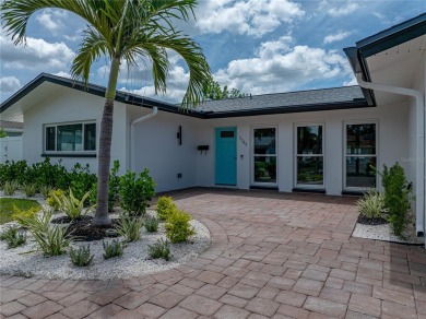 Welcome home, to this completely renovated coastal modern on Pasadena Yacht and Country Club in Florida - for sale on GolfHomes.com, golf home, golf lot