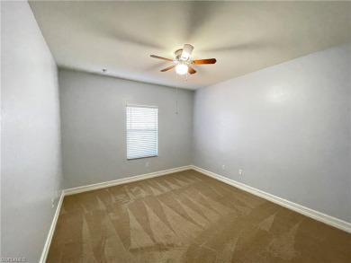 Freshly painted townhouse with master bedroom in downstairs on Vanderbilt Country Club in Florida - for sale on GolfHomes.com, golf home, golf lot