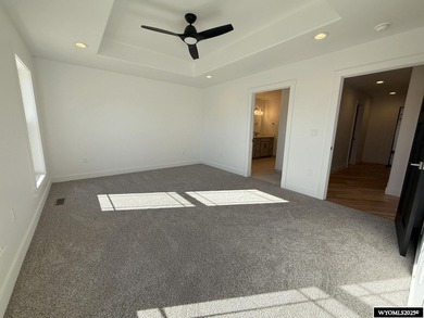 Step into this incredible custom-built home at 4225 Windsong on Riverton Country Club in Wyoming - for sale on GolfHomes.com, golf home, golf lot