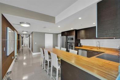 Exclusive boutique waterfront building with only 25 units on Indian Creek Country Club in Florida - for sale on GolfHomes.com, golf home, golf lot