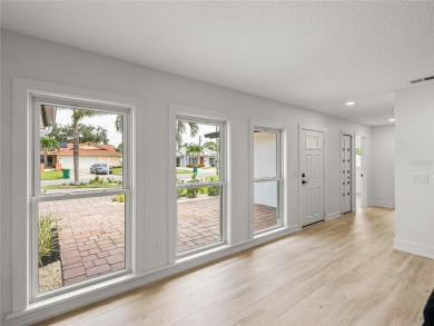 Welcome home, to this completely renovated coastal modern on Pasadena Yacht and Country Club in Florida - for sale on GolfHomes.com, golf home, golf lot