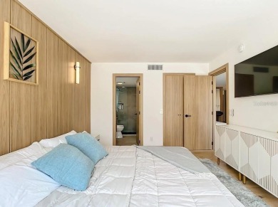Exquisite FULLY FURNISHED 2-Bed/2-Bath 1st floor Condo Just on Isla Del Sol Yacht and Country Club in Florida - for sale on GolfHomes.com, golf home, golf lot