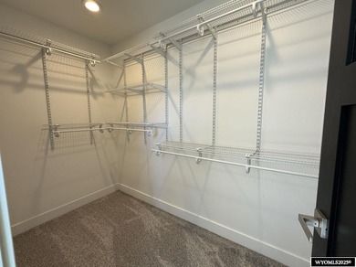 Step into this incredible custom-built home at 4225 Windsong on Riverton Country Club in Wyoming - for sale on GolfHomes.com, golf home, golf lot