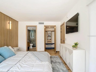 Exquisite FULLY FURNISHED 2-Bed/2-Bath 1st floor Condo Just on Isla Del Sol Yacht and Country Club in Florida - for sale on GolfHomes.com, golf home, golf lot