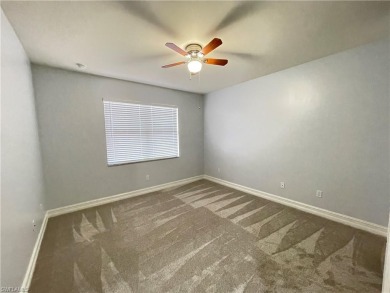 Freshly painted townhouse with master bedroom in downstairs on Vanderbilt Country Club in Florida - for sale on GolfHomes.com, golf home, golf lot