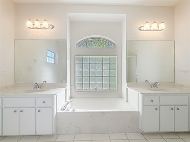 One or more photo(s) has been virtually staged. This stunning on Royal Oaks Golf Club in Florida - for sale on GolfHomes.com, golf home, golf lot