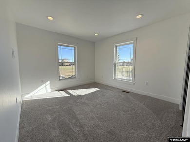 Step into this incredible custom-built home at 4225 Windsong on Riverton Country Club in Wyoming - for sale on GolfHomes.com, golf home, golf lot