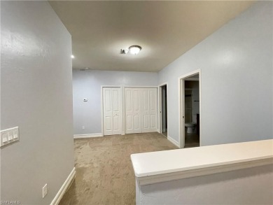 Freshly painted townhouse with master bedroom in downstairs on Vanderbilt Country Club in Florida - for sale on GolfHomes.com, golf home, golf lot