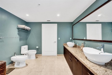Exclusive boutique waterfront building with only 25 units on Indian Creek Country Club in Florida - for sale on GolfHomes.com, golf home, golf lot