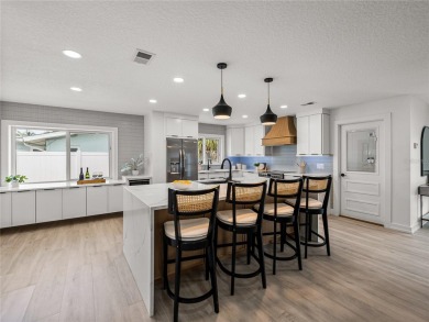 Welcome home, to this completely renovated coastal modern on Pasadena Yacht and Country Club in Florida - for sale on GolfHomes.com, golf home, golf lot