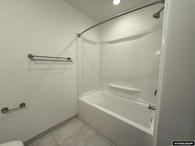 Step into this incredible custom-built home at 4225 Windsong on Riverton Country Club in Wyoming - for sale on GolfHomes.com, golf home, golf lot