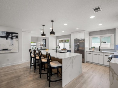 Welcome home, to this completely renovated coastal modern on Pasadena Yacht and Country Club in Florida - for sale on GolfHomes.com, golf home, golf lot