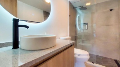 Exquisite FULLY FURNISHED 2-Bed/2-Bath 1st floor Condo Just on Isla Del Sol Yacht and Country Club in Florida - for sale on GolfHomes.com, golf home, golf lot