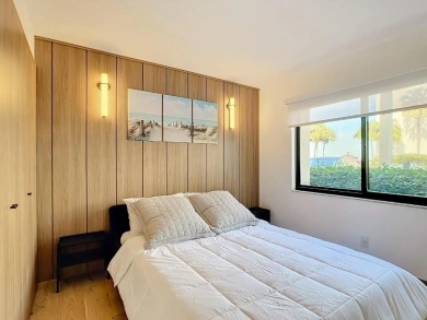 Exquisite FULLY FURNISHED 2-Bed/2-Bath 1st floor Condo Just on Isla Del Sol Yacht and Country Club in Florida - for sale on GolfHomes.com, golf home, golf lot
