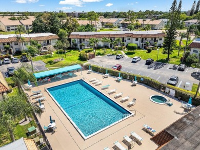 Situated on the second floor, this exceptional 55 plus condo on Forest Oaks Golf Club in Florida - for sale on GolfHomes.com, golf home, golf lot