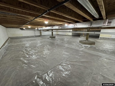 Step into this incredible custom-built home at 4225 Windsong on Riverton Country Club in Wyoming - for sale on GolfHomes.com, golf home, golf lot