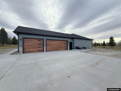 Step into this incredible custom-built home at 4225 Windsong on Riverton Country Club in Wyoming - for sale on GolfHomes.com, golf home, golf lot