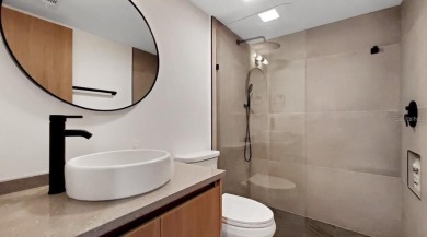 Exquisite FULLY FURNISHED 2-Bed/2-Bath 1st floor Condo Just on Isla Del Sol Yacht and Country Club in Florida - for sale on GolfHomes.com, golf home, golf lot