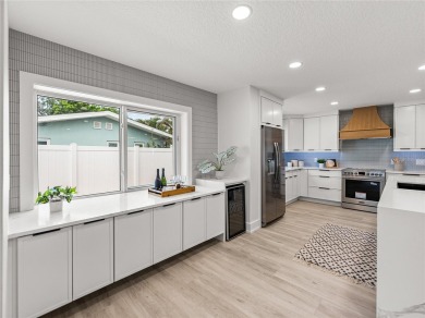 Welcome home, to this completely renovated coastal modern on Pasadena Yacht and Country Club in Florida - for sale on GolfHomes.com, golf home, golf lot