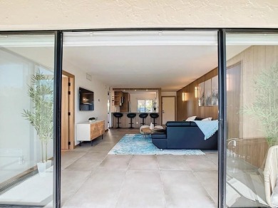 Exquisite FULLY FURNISHED 2-Bed/2-Bath 1st floor Condo Just on Isla Del Sol Yacht and Country Club in Florida - for sale on GolfHomes.com, golf home, golf lot