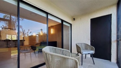Exquisite FULLY FURNISHED 2-Bed/2-Bath 1st floor Condo Just on Isla Del Sol Yacht and Country Club in Florida - for sale on GolfHomes.com, golf home, golf lot
