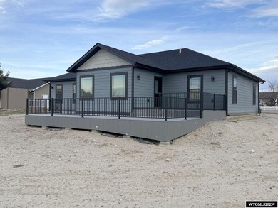 Step into this incredible custom-built home at 4225 Windsong on Riverton Country Club in Wyoming - for sale on GolfHomes.com, golf home, golf lot